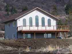 House with large windows and deck