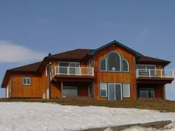 Wooden house with multiple decks